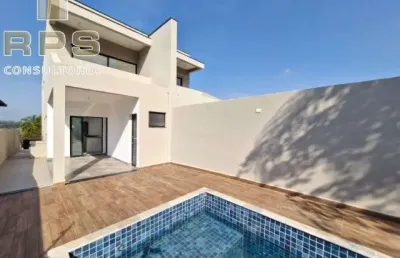 Casa pronta para morar no jardim paulista em atibaia, 3 suítes com sacadas, salas e cozinha integradas, espaço gourmet, piscina e área verde!