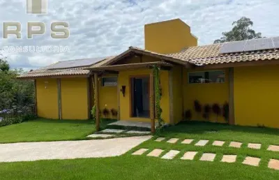 Chácara a venda no condomínio horto ivan, 04 suites , sendo 01 com closet  lavabo  salas amplas divididas em 3 ambientes, piscina , área gourmet