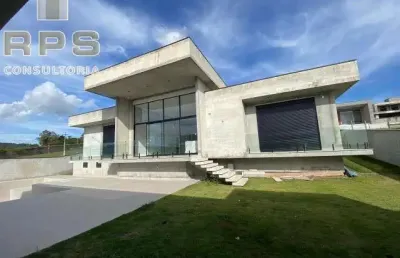 Casa térrea condominio equilibrium com cozinha integrada, sala de jantar, sala de estar 4 suítes com closet sendo uma máster com automação e sacada