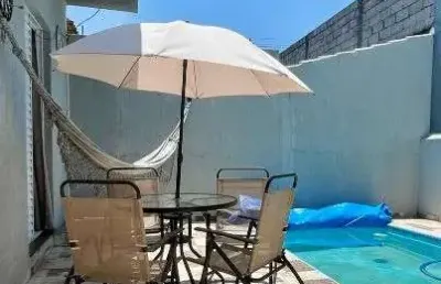 Casa a venda semibiliada , com 3 dormitórios sendo 1 suíte, cozinha , sala, 02 banheiros ,jardim de inverno área gourmet com piscina e churrasqueira