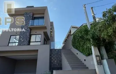 Casa alto padrão no terras de atibaia, 2 suítes e quarto reversível com banheiro completo, área de lazer completa, sala e cozinha em conceito aberto.