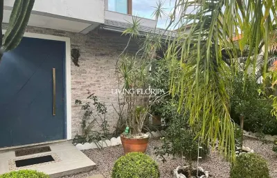 Casa com 4 quartos à venda na servidão dos artistas, 223, rio tavares, florianópolis por r$ 2.994.000