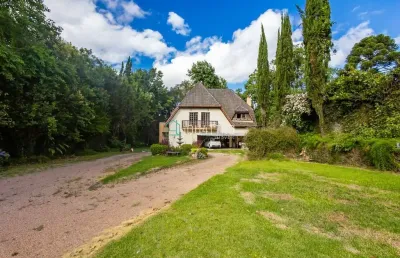 Casa com 4 quartos à venda na rua prodócimo lago, 1242, taboão, curitiba por r$ 1.980.000