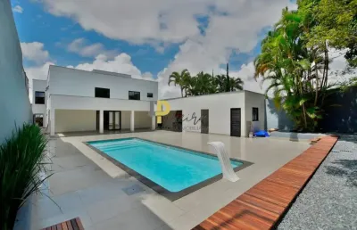 Luxo e conforto no jardim botânico: casa de 5 suítes com 815m² e área de lazer completa,