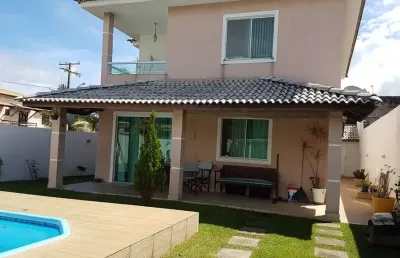 Casa em condomínio fechado de 3/4 sendo uma suíte em arembepe!