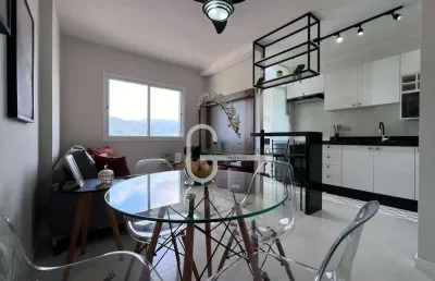 Apartamento com 2 dormitórios à venda, 62 m² por r$ 570.000,00 - centro - peruíbe/sp