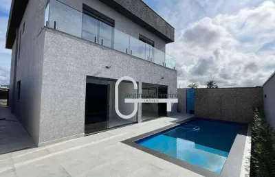 Casa com 4 dormitórios à venda, 262 m² por r$ 2.000.000,00 - condomínio flora rica - peruíbe/sp