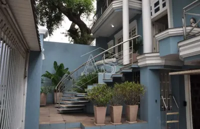 Casa com 4 quartos à venda na rua carlos huber, 1028, três figueiras, porto alegre por r$ 2.100.000