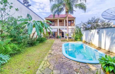 Casa com 4 quartos à venda na rua chile, 882, petrópolis, porto alegre, 417 m2 por r$ 1.690.000