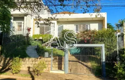 Casa com 3 quartos à venda na rua gustavo schmidt, 332, três figueiras, porto alegre, 248 m2 por r$ 1.275.000