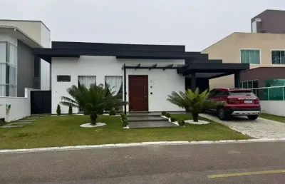 Casa 4 dormitórios, semi mobiliada, em condomínio fechado