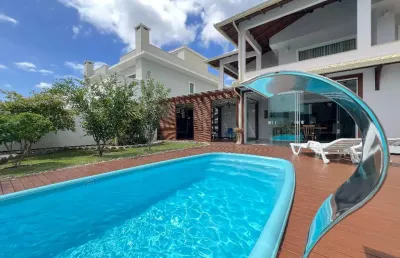 L# casa com 3 dormitorios de 2 suites mobilada com piscina e área gourmet