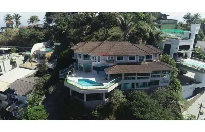 Vendo casa de alto luxo no joá.  exclusividade, privacidade e vista eterna para o mar  2.500m2 terreno / 863m2 de área útil. 5 suites