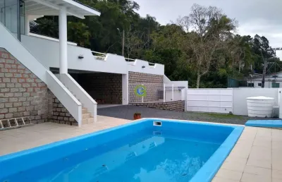 Casa de alto padrão na ponta de baixo, em são josé, 600 m² de área. 5 dormitório
