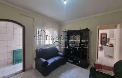 Casa para venda em praia grande, melvi, 2 dormitórios, 1 suíte, 3 banheiros, 2 vagas