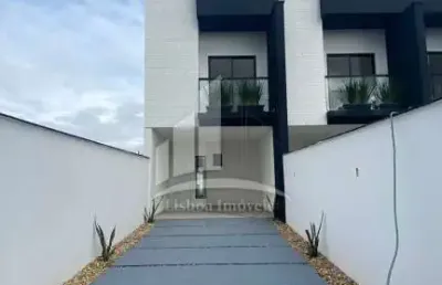 Geminado sobrado com 03 quartos sendo 01 suíte a venda no bairro vila nova !!