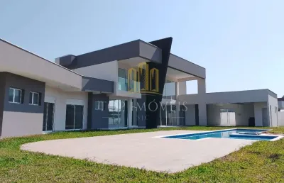 Exclusiva residencia terrea de alto padrao no condominio mont blanc | luxo, sustentabilidade e conforto em 1.200m2