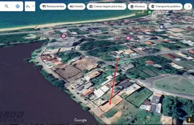 Terreno / lote murando à venda com 360 m² em nova guarapari-es, frente lagoa.