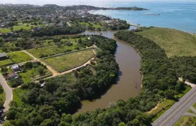 Lote / tereno à venda as margens da lagoa com vista para a praia de meaípe - guarapari-es