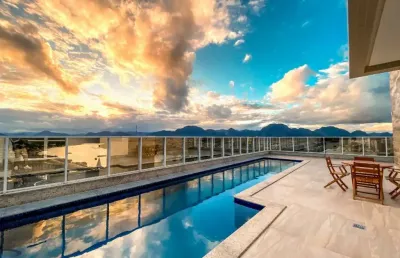 Apartamento à venda 2 quartos, 2 vagas no centro de guarapari, com lazer completo na cobertura.