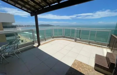Cobertura à venda na orla da praia do morro, mobiliada, 3 suites e 3 vagas de garagem.