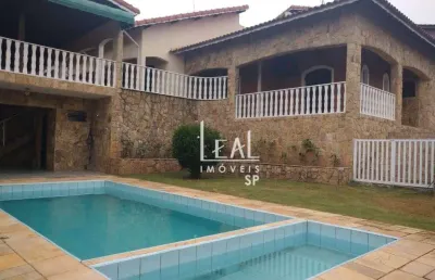 Casa com 4 dormitórios, 514 m² - venda por r$ 4.250.000,00 ou aluguel por r$ 17.683,78/mês - caputera - arujá/sp