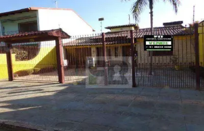 Excelente casa de 2 dorm. sendo uma suíte, localizada no bairro santa helena, alvorada, rs. privativos 104m².
