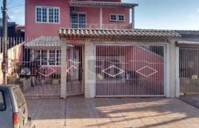 Excelente sobrado de 4 dorm. c/ 3 vagas de garagem, porto verde, alvorada/rs.