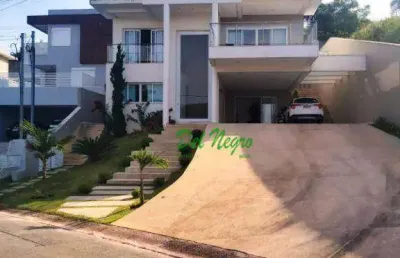Casa com 4 suítes à venda, 489 m² - golf village, granja viana.