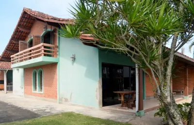 Espetacular sobrado para venda em suarão com 4 quartos, sendo 1 suíte, 205m²