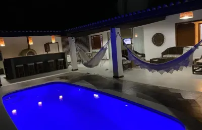 Casa em condomínio fechado com 5 quartos à venda no Itacimirim, Camaçari 