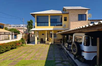 Imóvel de luxo em guarapari-es: casa à venda em itapebussu com 4 quartos, 2 suítes e amplo espaço!