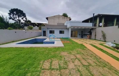 Casa nova moderna com piscina  churrasqueira, aceita financiamento bancário.