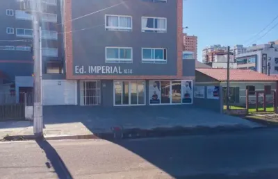 Apartamento semimobiliado no ed. imperial de tramandaí