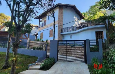 Casa à venda - 4 dormitórios e 3 suítes -  frente p/ área verde -  granja viana ll