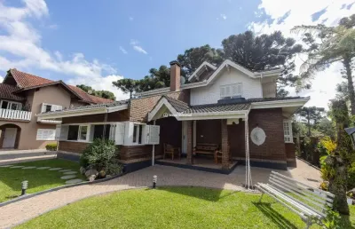 Casa em condomínio fechado com 4 quartos à venda na bruno ernesto riegel, 792, planalto, gramado por r$ 3.700.000
