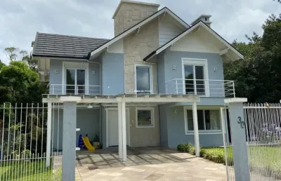 Casa com 4 quartos à venda na acer, 30, vivendas do arvoredo, gramado por r$ 2.100.000