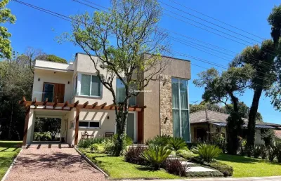 Casa em condomínio fechado com 3 quartos à venda na laurindo comiotto, 1068, lagos de gramado, gramado por r$ 4.250.000