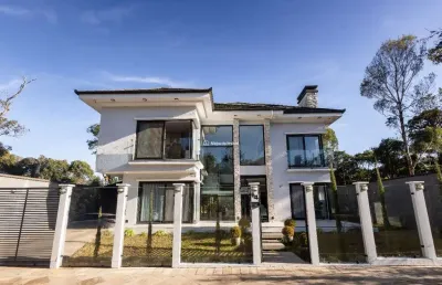 Casa em condomínio fechado com 4 quartos à venda na cerejeira, 64, vivendas do arvoredo, gramado por r$ 4.000.000