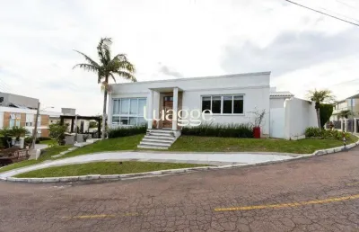 Casa em condomínio fechado com 6 quartos à venda na Rua Alcebíades Antônio dos Santos, 447, Nonoai, Porto Alegre