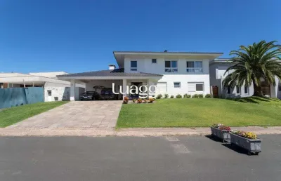 Casa no condomínio terra ville com 5 suítes, sendo duas suítes master, duas suítes americanas e uma suíte térrea.