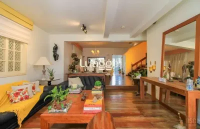 Casa living para 3 ambientes com lavabo, cozinha com pia e armários planejados