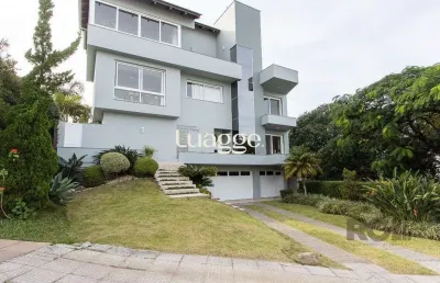 Casa em condomínio fechado com 3 quartos à venda na Rua Alcebíades Antônio dos Santos, 433, Nonoai, Porto Alegre