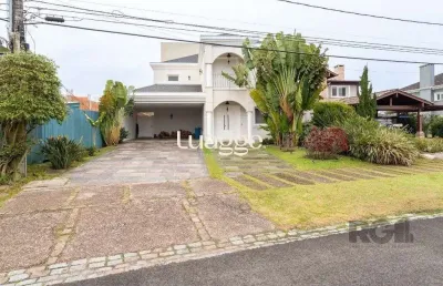 Casa em condomínio fechado com 3 quartos à venda na Avenida Juca Batista, 9067, Belém Novo, Porto Alegre