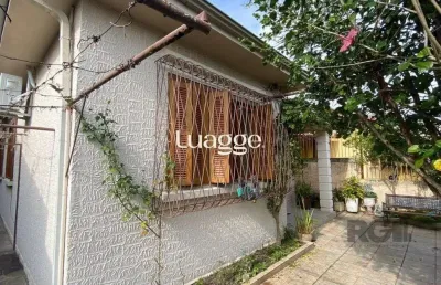 Casa com 3 quartos à venda na Rua Dona Firmina, 806, Vila São José, Porto Alegre
