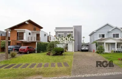 Casa em condomínio fechado com 3 quartos à venda na Avenida Juca Batista, 9055, Belém Novo, Porto Alegre