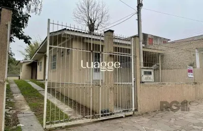 Casa com 3 quartos à venda na Rua Miguel Ascoleze, 320, Vila Nova, Porto Alegre