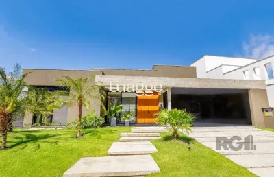 Casa em condomínio fechado com 3 quartos à venda na Avenida Juca Batista, 8082, Belém Novo, Porto Alegre