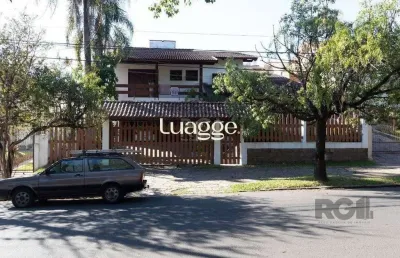 Casa com 4 quartos à venda na Rua Upamaroti, 874, Cristal, Porto Alegre