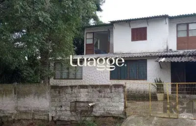 Casa com 5 quartos à venda na Rua Victor Silva, 634, Camaquã, Porto Alegre
